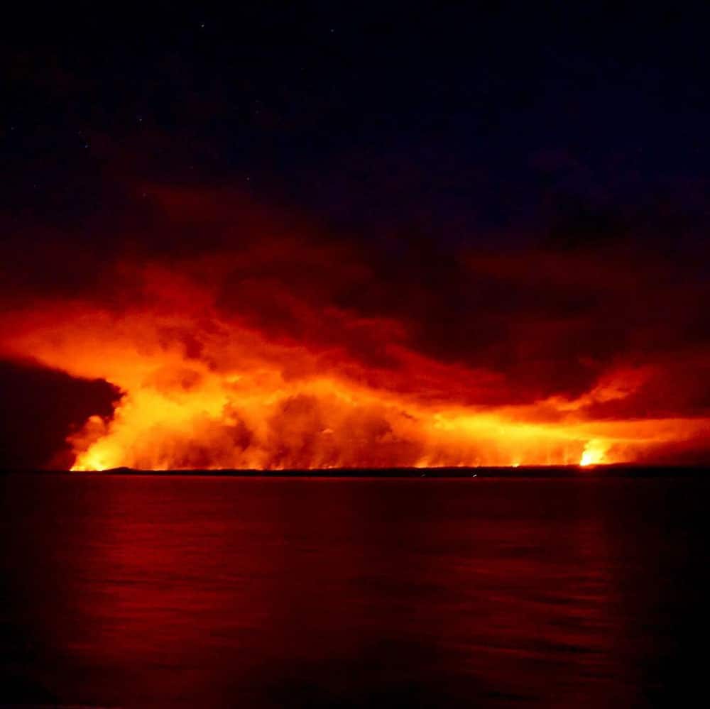 Nighttime sail past Kilauea Volcano – Big Island